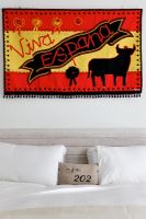 Spanish flag wall hanging in modern bedroom 
