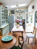 Tables and chairs in classic kitchen
