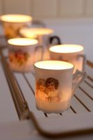 Candles in classic tea cups