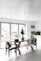 Modern dining table and chairs in kitchen 