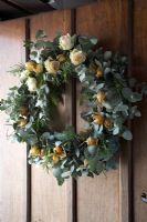 Christmas wreath decorating door 