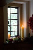 Church candle in window