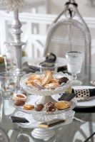 Cake stand on modern dining table 