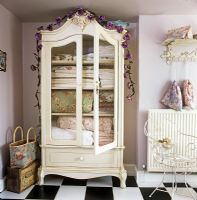 Linen cupboard with floral bedding
