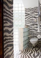 Modern bathroom with patterned tiles 