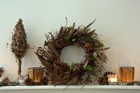 Christmas wreath on mantelpiece 
