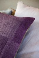 Detail of purple and lilac cushions 