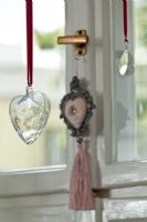 Heart decorations on kitchen window