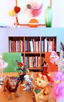 Colourful toys and objects on dining table