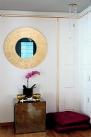 Modern table and mirror in hallway