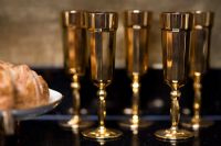 Detail of gold wine glasses 