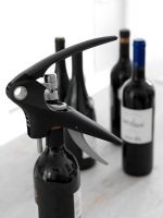 Wine bottles and opener detail 