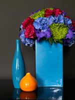 Blue vase and flower arrangement detail 