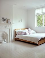 Modern white painted bedroom 
