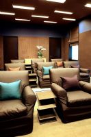 Rows of armchairs in home cinema