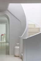 White curved modern staircase 