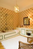 Classic bathroom with patterned wallpaper