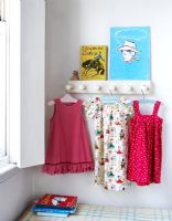 Hooks and clothes in childrens bedroom 
