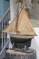 Modle ship on reclaimed wooden barrel