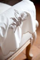Close up of embroidered armchair cover