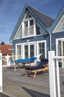Hammock and recliner on beach house verander