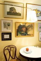 Framed paintings on wall 
