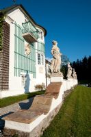 Statues outside classic country house 