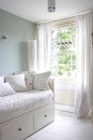 Modern feminine white bedroom 