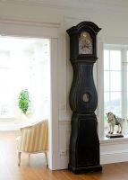 Classic Scandinavian clock in hallway 