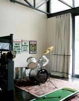 Modern teenagers bedroom with drum kit
