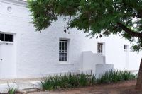 Exterior of whitewashed country house