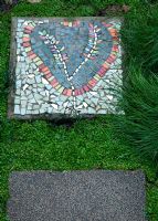 Heart mosaic in garden 