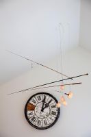 Fishing rod light and wall clock, detail