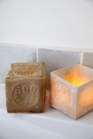 Modern candle and soap in bathroom, detail