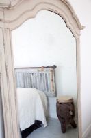 Modern bedroom with distressed wardrobe 
