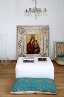 Modern living room with religious painting 