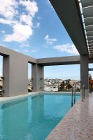 Modern swimming pool on roof terrace 