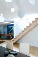Modern staircase in dining room 
