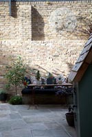 Walled garden with vintage table