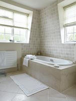 Contemporary bathroom with sloping walls