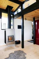 Open plan living area with stove