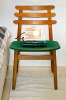 Chair used as bedside table