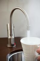 Person using hot tap
