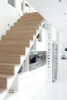 Staircase over modern kitchen