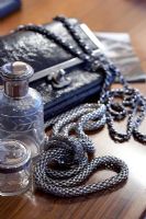 Jewellery and accessories on table, detail