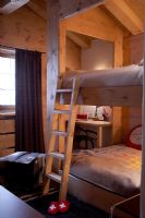 Modern childrens room with bunk beds 