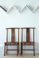 Modern shelves and oriental chairs