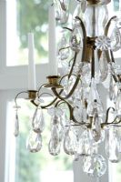 Modern chandelier with candles 