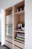 Hidden storage in contemporary kitchen