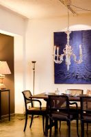 Classic dining room with modern artwork